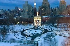 31 New York Washington Square Park With Snow And Empire State Building Behind.jpg